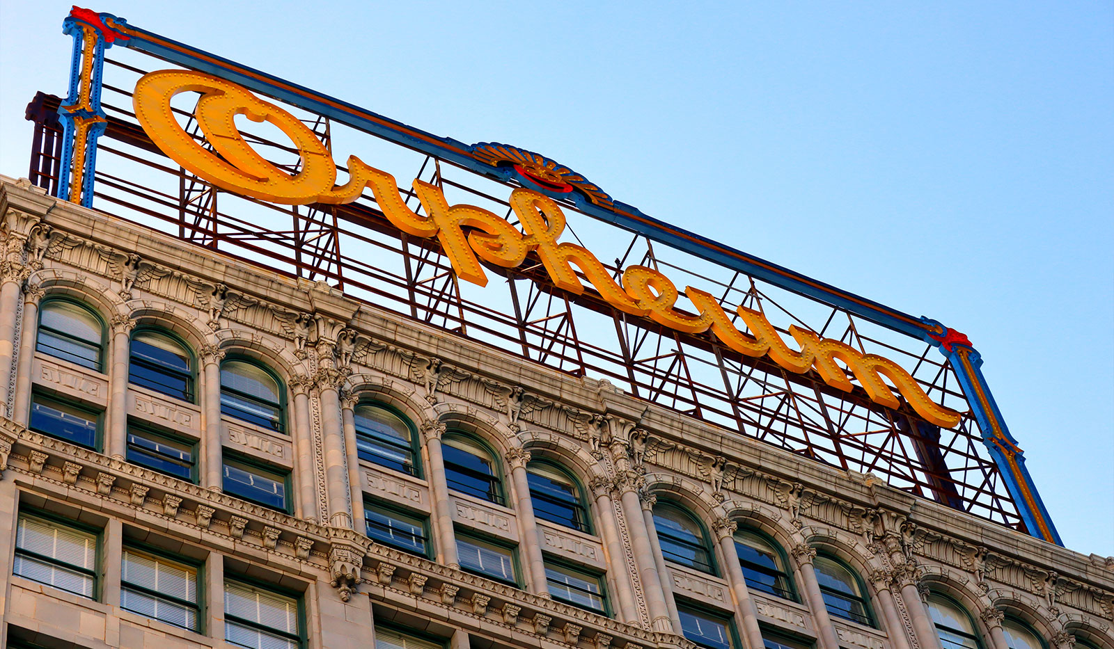 Looking up at Orpheum sign atop building