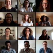 A team of people on an online conference call. Grid of webcam faces