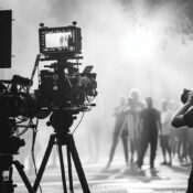 Film crew records a movie scene in the city