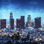 In the evening, downtown Los Angeles with a technology screen